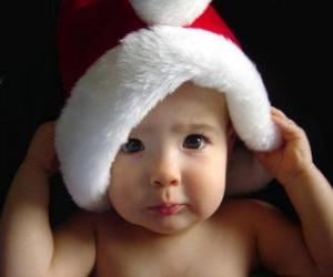 Układanka Chłopiec z kapeluszem Święty Mikołaj czy Santa Claus