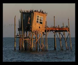 Układanka Domek na palach z chaty rybaków, budowy wspierane na palach na jeziorze