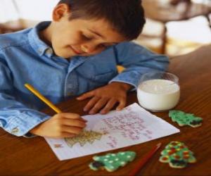 Układanka Dziecko pisze list do Świętego Mikołaja