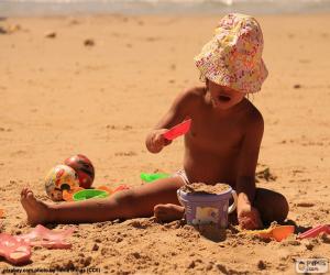 Układanka Dziewczyna gra na plaży