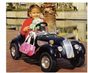 Układanka Dziewczyna na klasyczny samochód-zabawkę