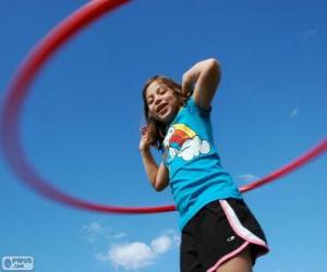 Układanka Dziewczynka z obręczą w hula, hula hoop w pasie spinning