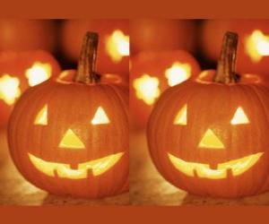 Układanka Halloween Pumpkins rzeźbione z twarzy i zapalił świeczkę wewnątrz lub błędny ognik