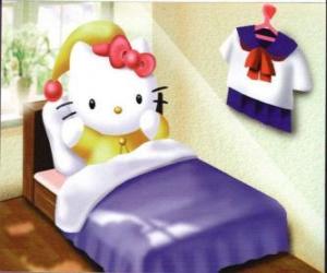 Układanka Hello Kitty w łóżku