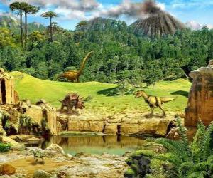 Układanka Kilka dinozaurów z erupcji wulkanu w tle