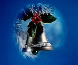 Układanka Niebieskim tle dzwonka Bożonarodzeniowego