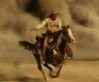 Kowboj jazdy konnej