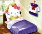 Hello Kitty w łóżku