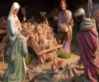 Święta Rodzina w stajence z wołu i muł, z pasterzem owiec i król podając prezenty dla Jezusa