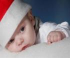 Chłopiec z kapeluszem Święty Mikołaj czy Santa Claus