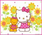 Hello Kitty z drinkiem na wsi z jej pluszowego misia Tiny Chum