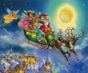 Układanka Santa Claus latające sanie nad domami podczas Wigilii