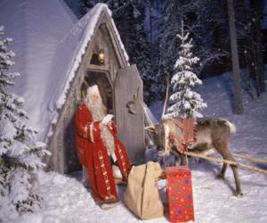 Układanka Santa u drzwi domu z reniferów i prezentów