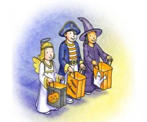 Układanka Troje dzieci ubrane na trick lub leczenia - duch, czarownica i diabeł z torby