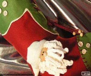 Układanka Świąteczne skarpety ozdobione twarz Świętego Mikołaja i przyciski