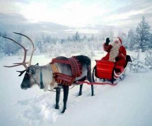 Układanka Święty Mikołaj czy Santa Claus w jej magiczne latające sanie ciągnione przez renifery świąteczne
